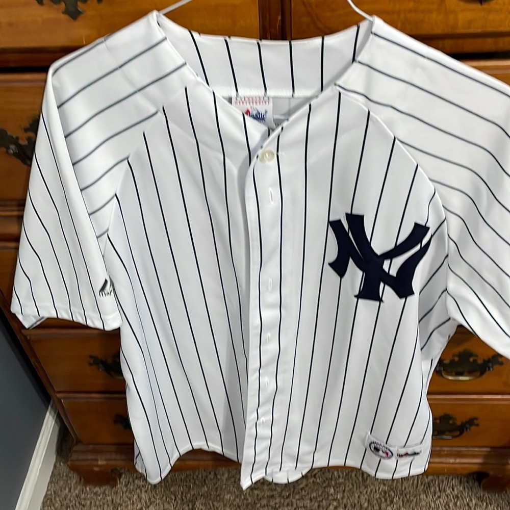 NY Yankees Jersey. Jorge Posada. #20. Only worn a couple times. It’s too big.